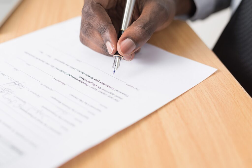 tenant-signing-a-tenancy-agreement