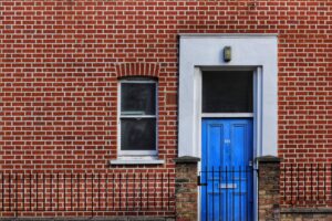 brick-house-with-blue-door